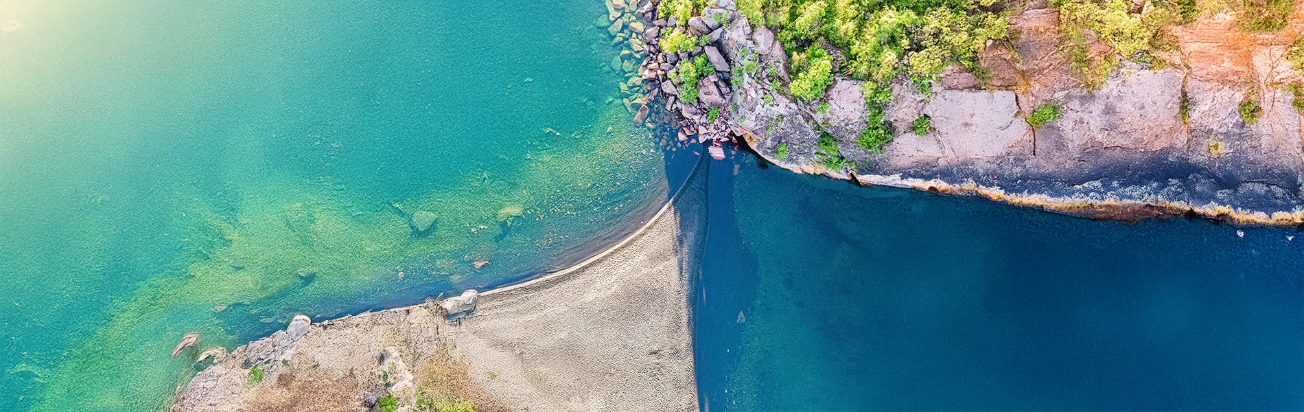 beach water with rocky coast